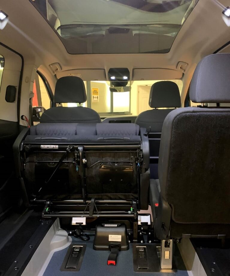 FORD-TOURNEO-GRAND-WAV-WHEELCHAIR-ACESSABLE-VEHICLE-SHOWING-SEATS-FLIPPED-FORWARD