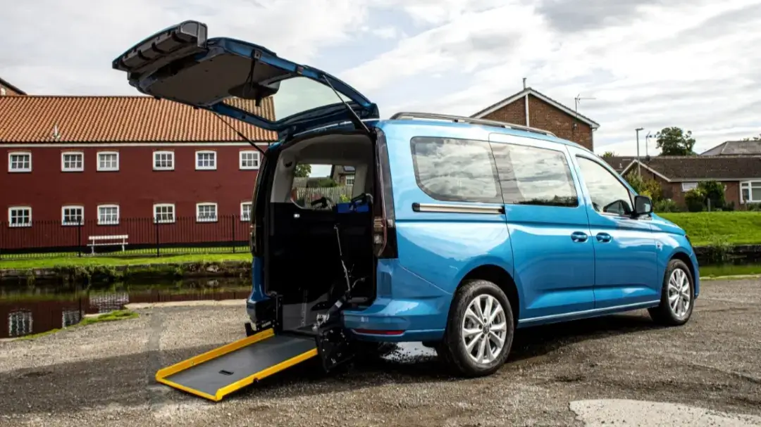 Alfred Bekker Ford Tourneo Connect Grand Wheelchair accessible vehicle with ramp deployed showing wheelchair inside